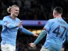 Erling Haaland from Manchester City celebrates the scoring of the third goal alongside his teammate Phil Foden in the Premier League encounter between Manchester City and Manchester United at Etihad Stadium.